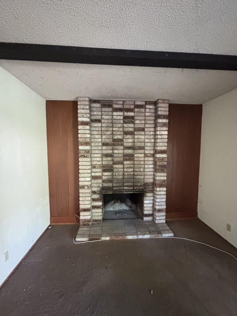 South Park Victoria Drive living room and fireplace before the EPRE renovation